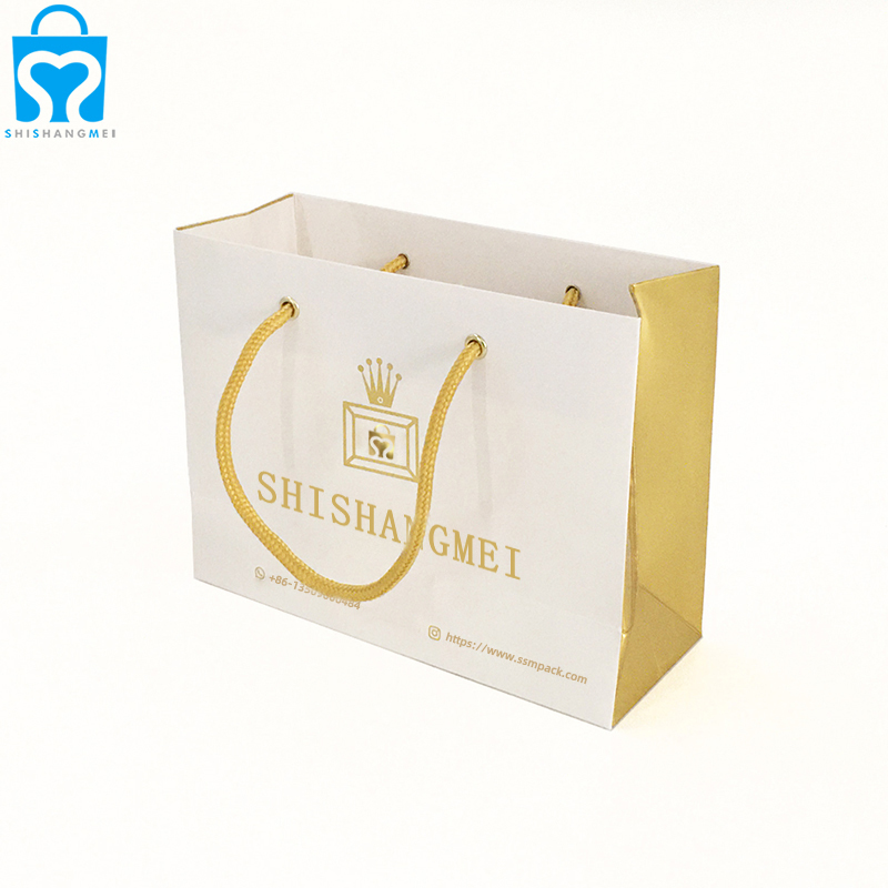 Золотая блестящая ламинированная сумка с печатью на заказ, фирменныеювелирные изделия, которые вы дарите, упаковочная бумажная сумка дляпокупок на вынос с ручкой, напечатанной с логотипом,цена Низкая Золотаяблестящая ламинированная сумка с